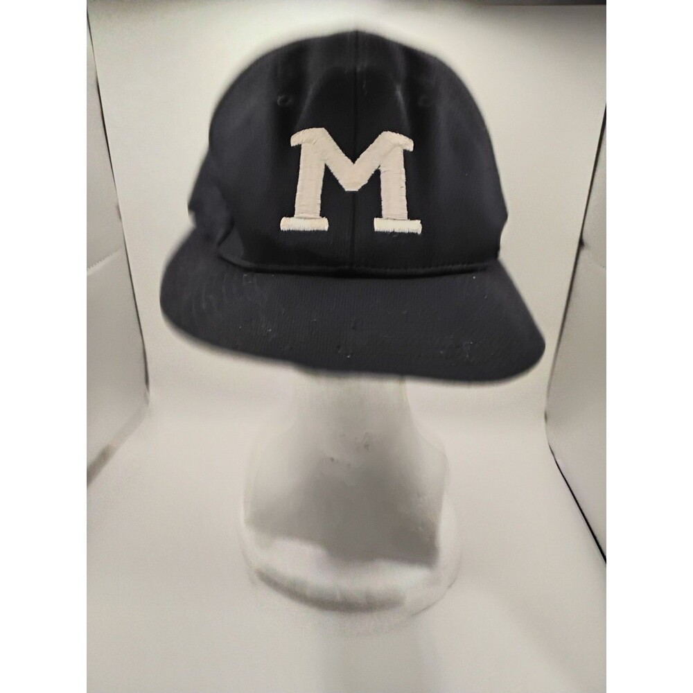 BLUE HAT WITH M AND CROSS